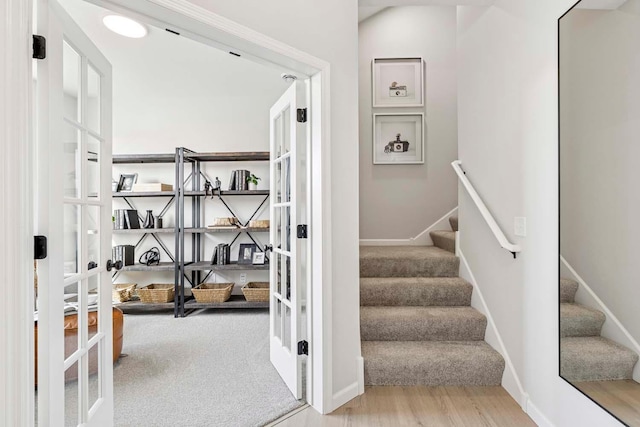 10974 37th St N, Lake Elmo, MN 55042 - stairway with baseboards and french doors
