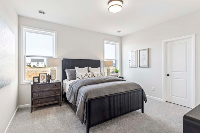 10974 37th St N, Lake Elmo, MN 55042 - bedroom with carpet floors and baseboards