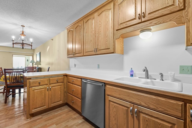 11030 Mississippi Blvd NW Unit 221, Coon Rapids, MN 55433 - kitchen featuring dishwasher, a sink, a peninsula, light wood-type flooring, and light countertops