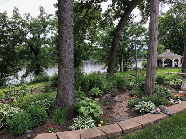 11030 Mississippi Blvd NW Unit 221, Coon Rapids, MN 55433 - view of yard featuring a gazebo and a water view