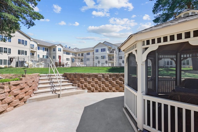 11030 Mississippi Blvd NW Unit 221, Coon Rapids, MN 55433 - view of home's community with a residential view, a patio, and a yard
