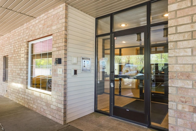 11030 Mississippi Blvd NW Unit 221, Coon Rapids, MN 55433 - entrance to property with brick siding