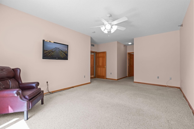 11030 Mississippi Blvd NW Unit 221, Coon Rapids, MN 55433 - living room with carpet floors, a ceiling fan, and baseboards