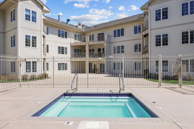 11030 Mississippi Blvd NW Unit 221, Coon Rapids, MN 55433 - view of swimming pool featuring fence, a pool, and a patio area