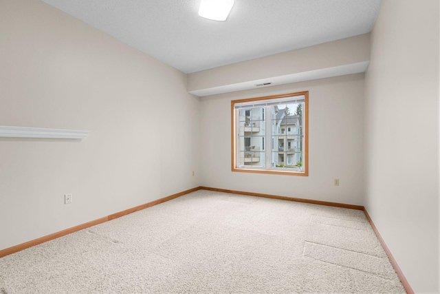 11030 Mississippi Blvd NW Unit 221, Coon Rapids, MN 55433 - spare room featuring light colored carpet and baseboards