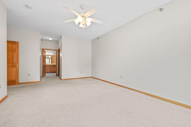 11030 Mississippi Blvd NW Unit 221, Coon Rapids, MN 55433 - unfurnished room featuring baseboards, ceiling fan, light carpet, and a smoke detector