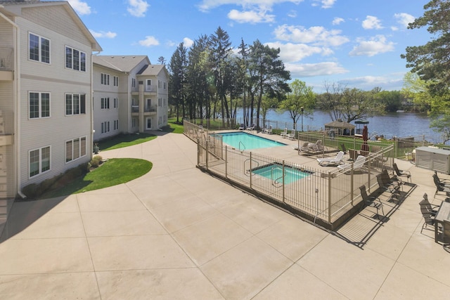 11030 Mississippi Blvd NW Unit 221, Coon Rapids, MN 55433 - community pool featuring a patio area and a water view