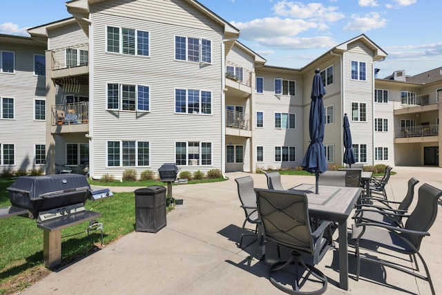 11030 Mississippi Blvd NW Unit 221, Coon Rapids, MN 55433 - view of patio / terrace featuring grilling area