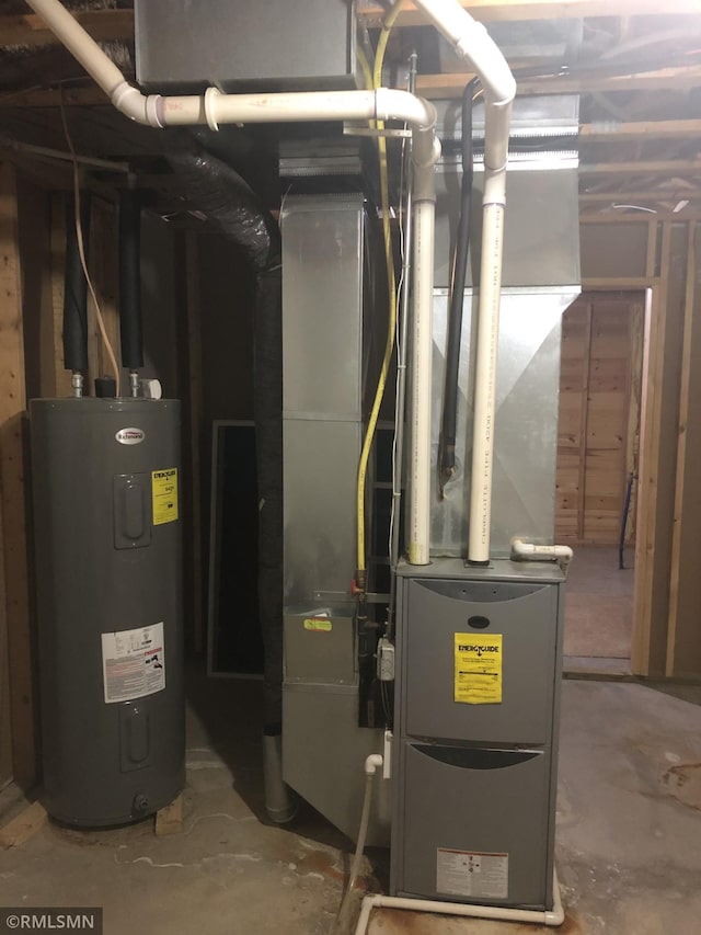 utility room with electric water heater