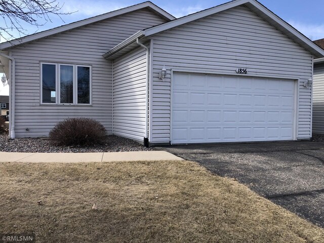 1856 Scenic Heights Ct SW, Hutchinson, MN 55350 - view of side of home with a garage and driveway