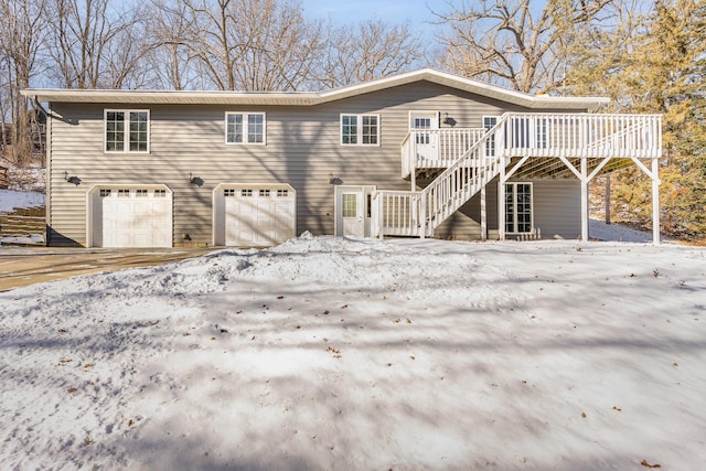 exterior space featuring a garage and a deck