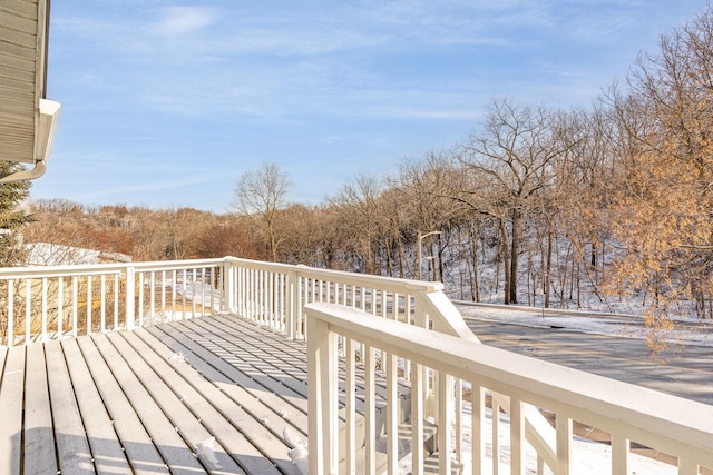 view of snow covered deck