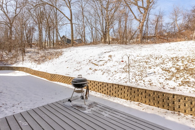 view of snow covered deck