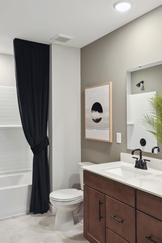 full bathroom featuring vanity, toilet, and shower / bath combo with shower curtain