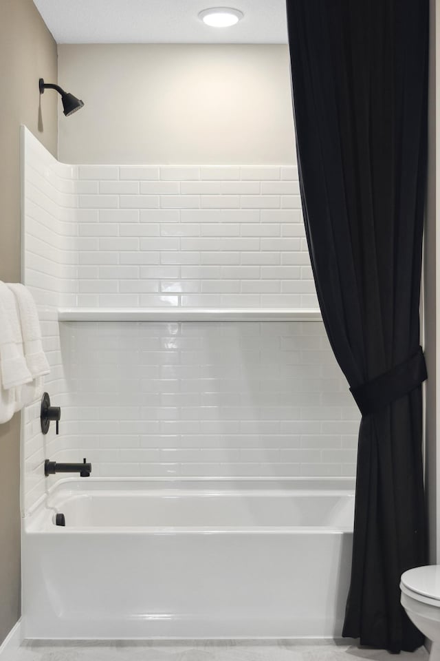 bathroom featuring shower / tub combo with curtain