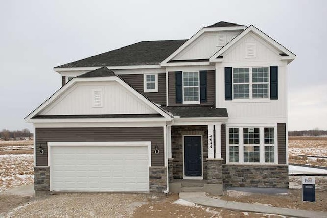 craftsman-style home with a garage