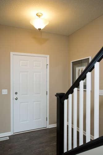 foyer entrance with dark hardwood / wood-style floors