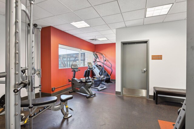 gym with a drop ceiling