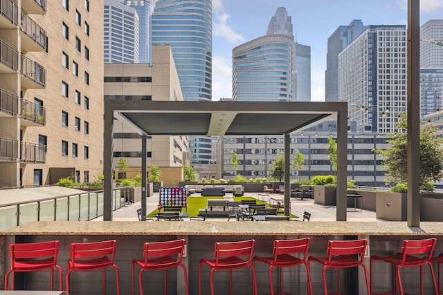 view of patio / terrace with an outdoor bar