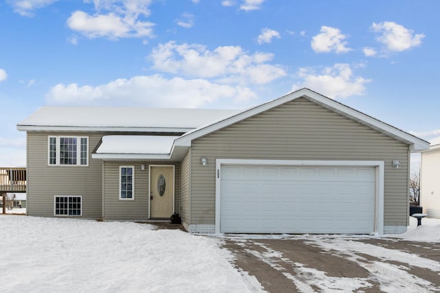 view of front of home with a garage