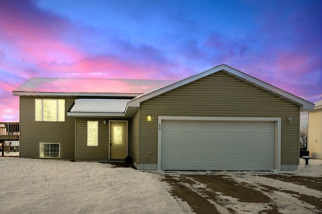 view of front of property featuring a garage