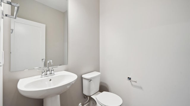 7472 170th Ave NW, Ramsey, MN 55303 - bathroom featuring toilet and a sink