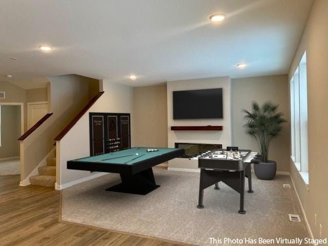 rec room featuring recessed lighting, a fireplace, wood finished floors, billiards, and baseboards