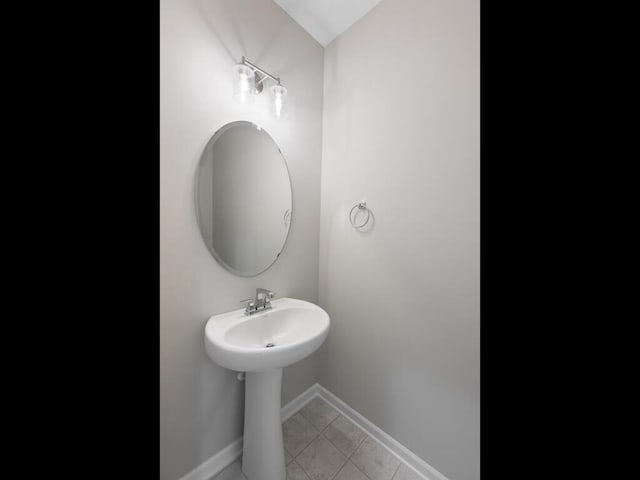 bathroom with tile patterned flooring