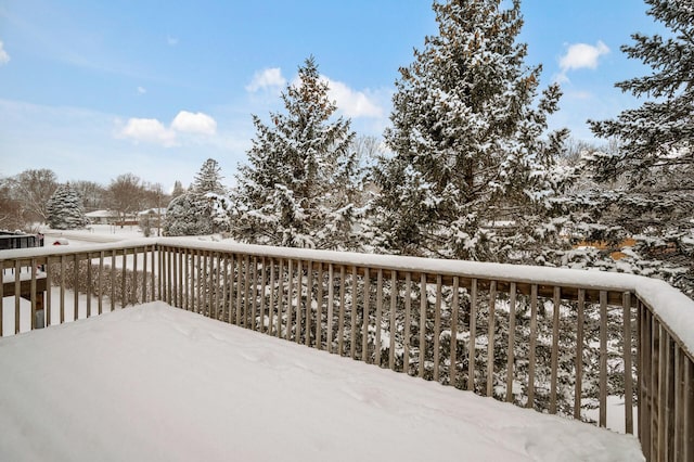 view of snow covered deck