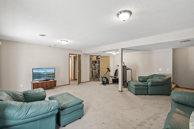 living room featuring light colored carpet and a textured ceiling