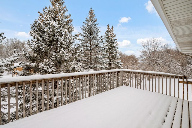 view of snow covered deck