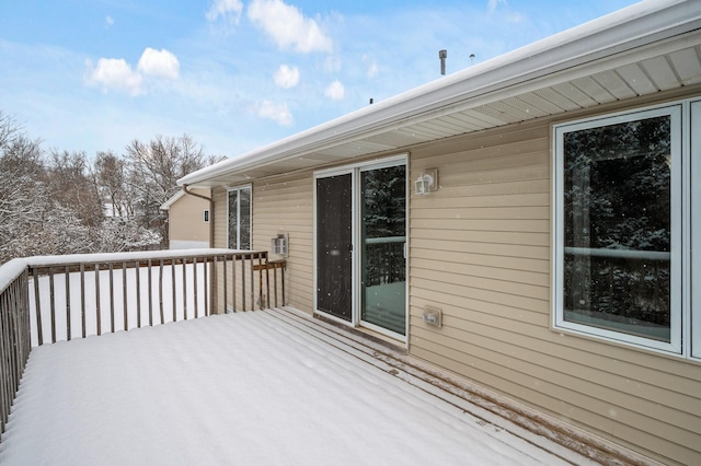 view of snow covered deck