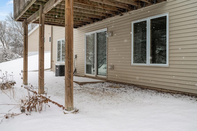 view of snow covered patio