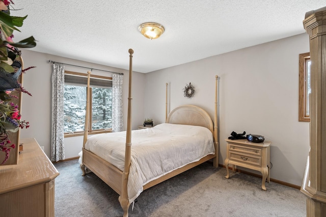 carpeted bedroom with a textured ceiling