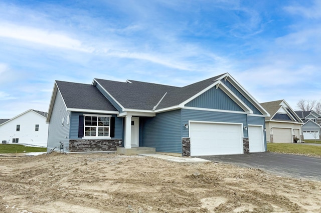 craftsman-style house featuring a garage