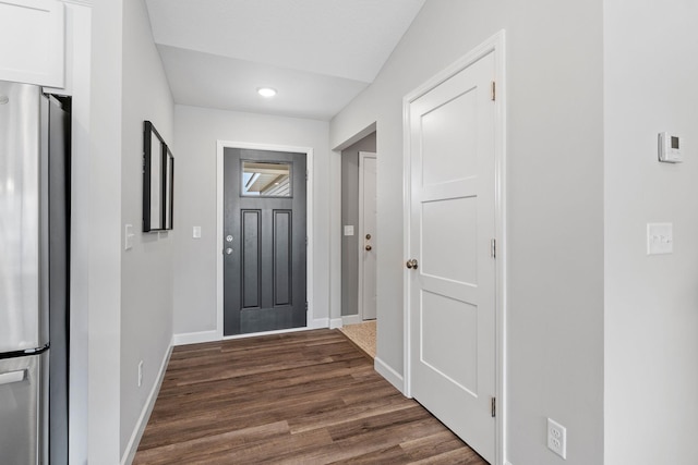 entryway with dark wood-type flooring