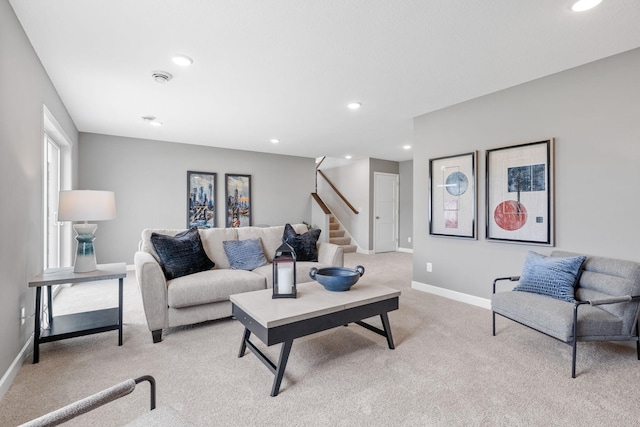 living room with light colored carpet