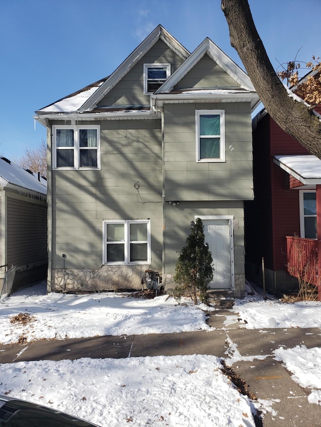 view of snow covered property