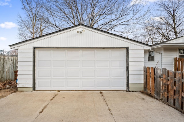 garage with fence