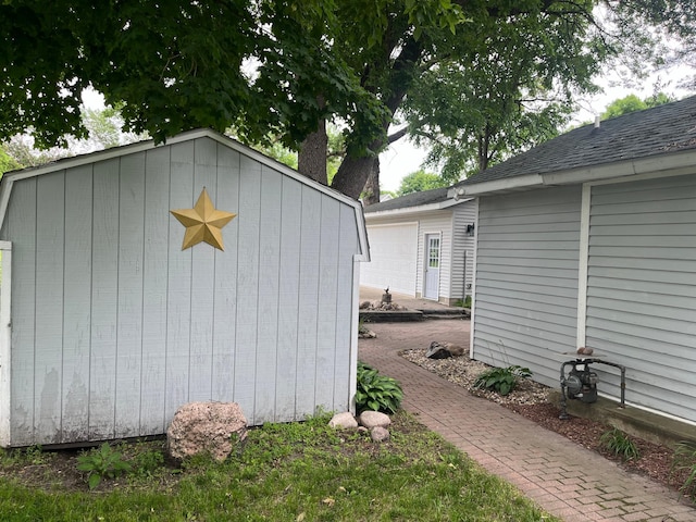 exterior space featuring a shed