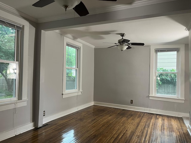 empty room featuring ornamental molding, ceiling fan, and dark hardwood / wood-style flooring