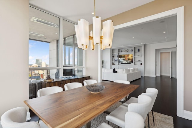 dining area featuring dark hardwood / wood-style floors