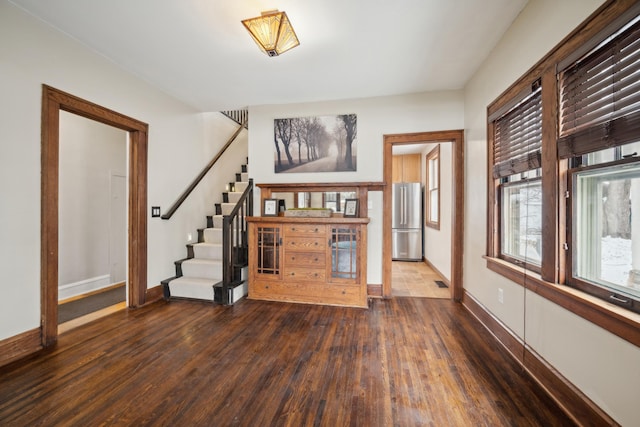 living room featuring dark hardwood / wood-style floors