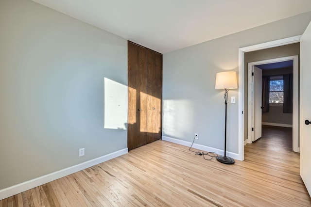 unfurnished bedroom featuring light hardwood / wood-style flooring