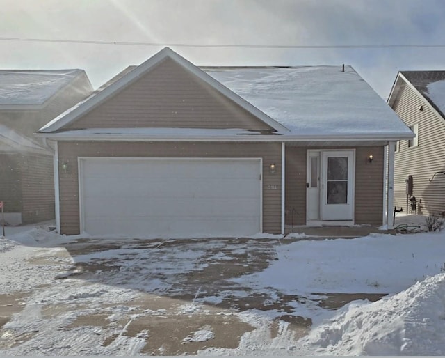 view of front of property featuring a garage