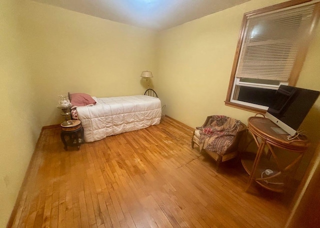 bedroom featuring hardwood / wood-style floors