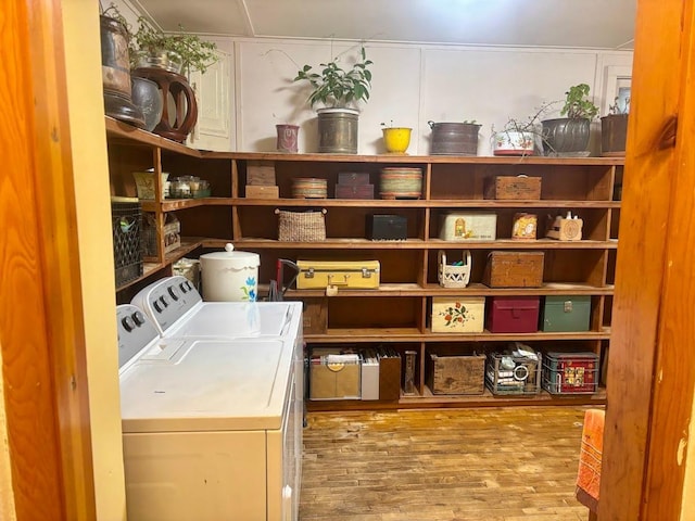 washroom featuring laundry area and washer and dryer