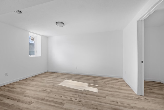 empty room featuring light hardwood / wood-style floors