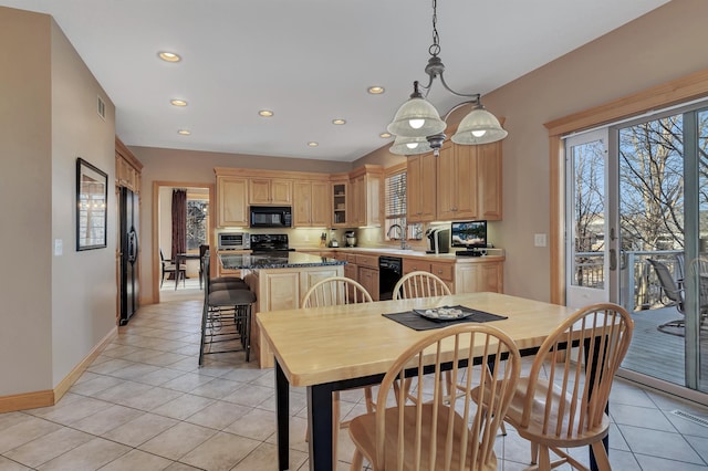 view of tiled dining space