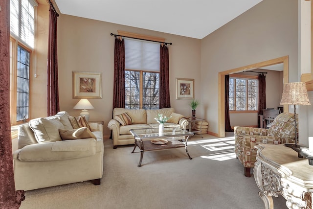 living room with light carpet and a wealth of natural light